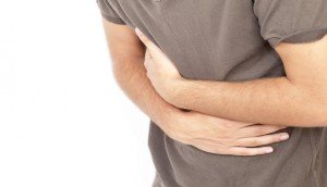 Оперізуючий біль в області шлунка і спини: основні причини