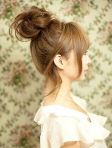 Зачіски з пучками Зачіски з пучками