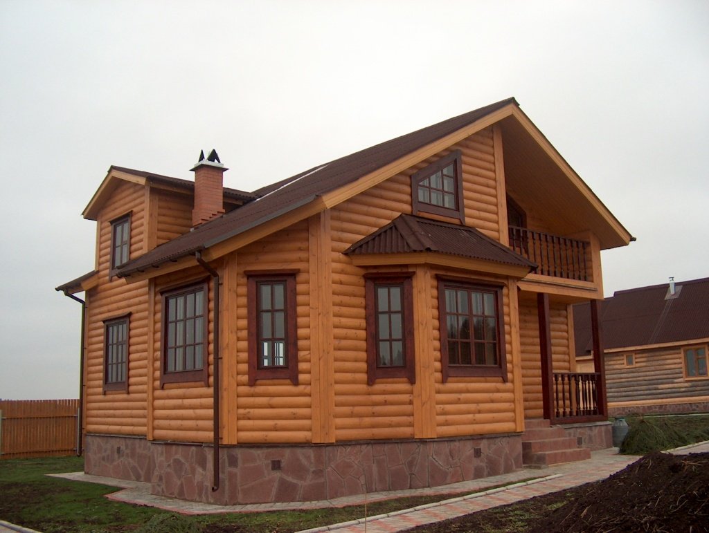 Зовнішня обробка будинку з бруса своїми руками (фото)