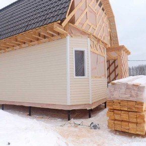 Зимове будівництво каркасного будинку з фото 50