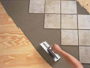 Традиційна технологія   як укладається плитка на деревяну підлогу
