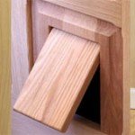 Двері для кішки : типи проходів для тварин