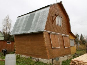 Реконструкція деревяних будинків: особливості та етапи робіт. Заміна колод нижнього вінця
