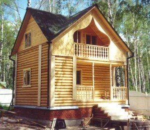 Двоповерхові деревяні будинки: основні матеріали. Будинки з відкритими верандами