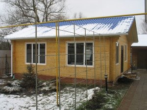 Деревяний будинок 7 на 7: особливості планування та будівництва