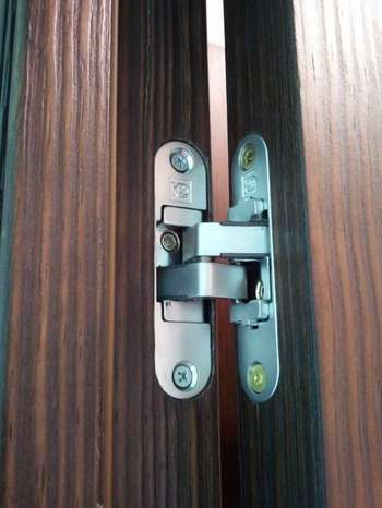 Приховані петлі для дверей