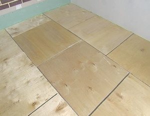 Традиційна технологія   як укладається плитка на деревяну підлогу