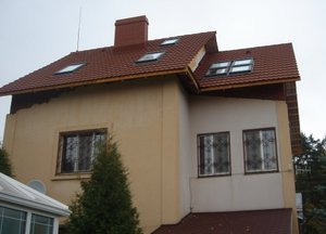 Типи і фото мансардних дахів для приватних будинків
