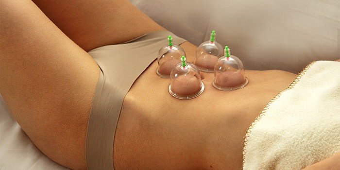 Про вакуумному масажі живота і антицелюлітному масажі боків за допомогою банок